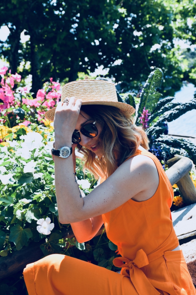 Style details: Watch - JULIEN DE BOURG, the Beauvoir collection, Beauvoir Silver; Sunglasses - PRADA; Jumpsuit - IPEKYOL