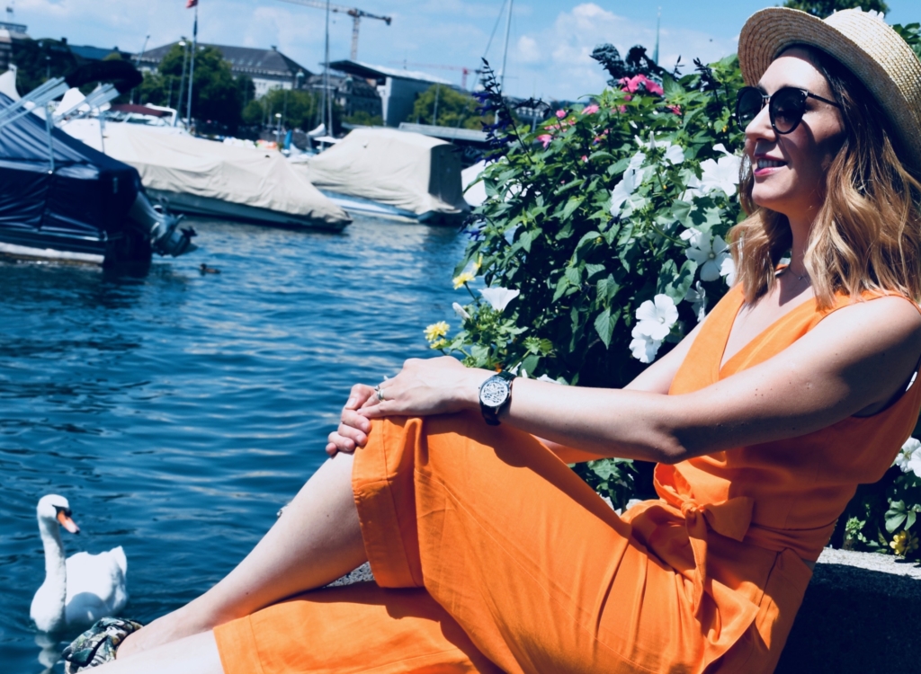 Style details: Watch - JULIEN DE BOURG, the Beauvoir collection, Beauvoir Silver; Sunglasses - PRADA; Jumpsuit - IPEKYOL