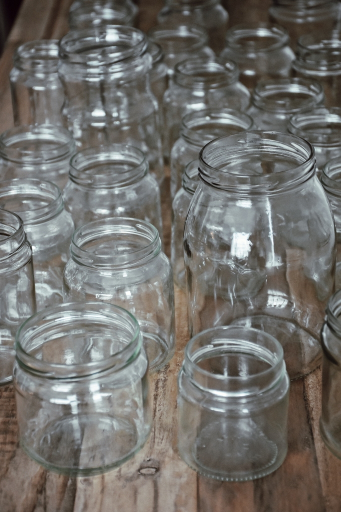 Empty glass jars and bottles will be transformed to the elegant interior decorations