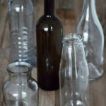 Empty glass jars and bottles will be transformed to the elegant interior decorations