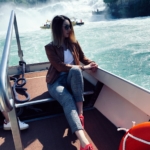 lifestyle blogger on the boat in front of Rheinfalls